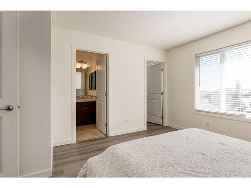 35 Nolanfield Heights Nw, Calgary, AB - Indoor Photo Showing Bedroom