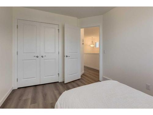 35 Nolanfield Heights Nw, Calgary, AB - Indoor Photo Showing Bedroom