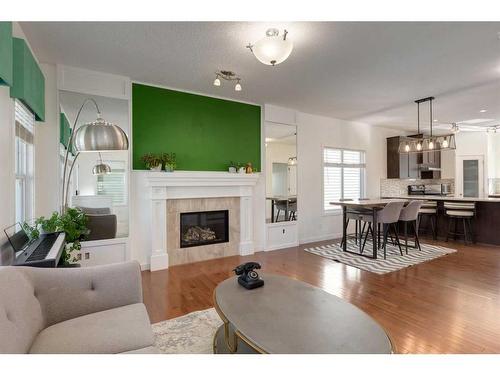 35 Nolanfield Heights Nw, Calgary, AB - Indoor Photo Showing Living Room With Fireplace