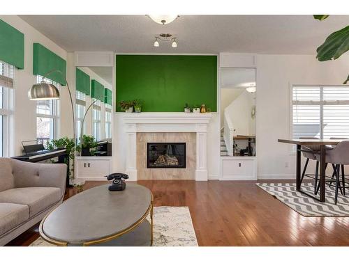 35 Nolanfield Heights Nw, Calgary, AB - Indoor Photo Showing Living Room With Fireplace