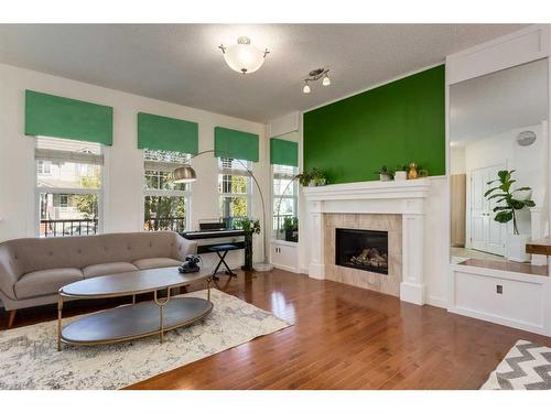 35 Nolanfield Heights Nw, Calgary, AB - Indoor Photo Showing Living Room With Fireplace