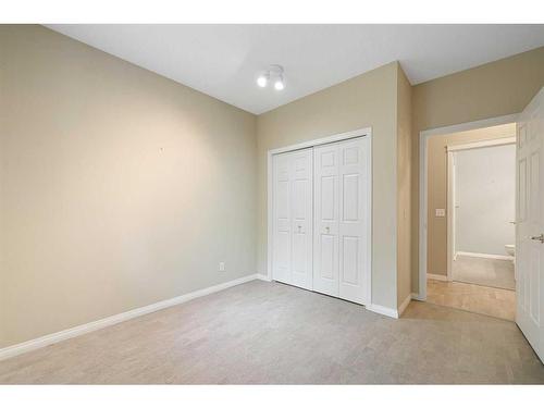 210-5201 Dalhousie Drive Nw, Calgary, AB - Indoor Photo Showing Other Room