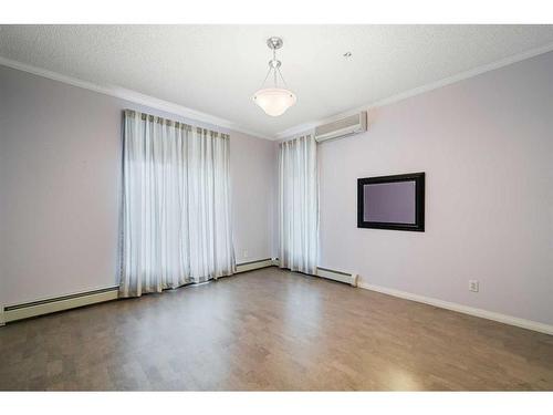 210-5201 Dalhousie Drive Nw, Calgary, AB - Indoor Photo Showing Other Room