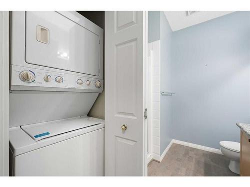 210-5201 Dalhousie Drive Nw, Calgary, AB - Indoor Photo Showing Laundry Room