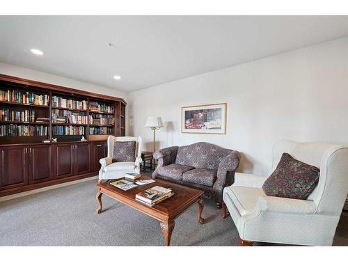 210-5201 Dalhousie Drive Nw, Calgary, AB - Indoor Photo Showing Living Room