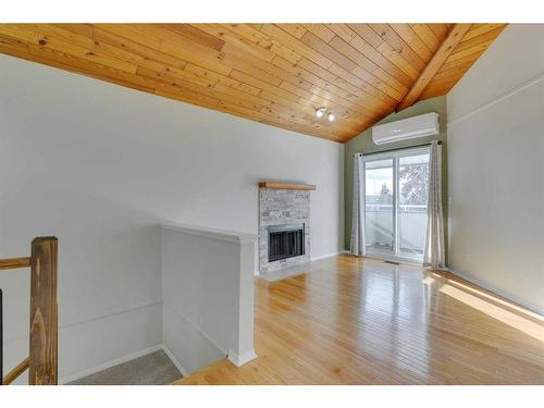 260-4037 42 Street Nw, Calgary, AB - Indoor With Fireplace