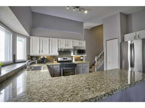 2513 Douglas Woods Link Se, Calgary, AB - Indoor Photo Showing Kitchen With Stainless Steel Kitchen With Double Sink