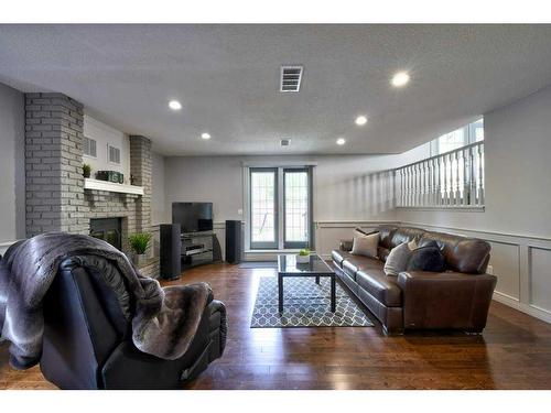 2513 Douglas Woods Link Se, Calgary, AB - Indoor Photo Showing Living Room With Fireplace