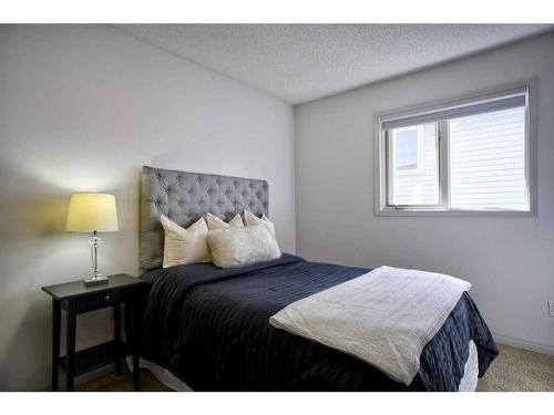 2513 Douglas Woods Link Se, Calgary, AB - Indoor Photo Showing Bedroom