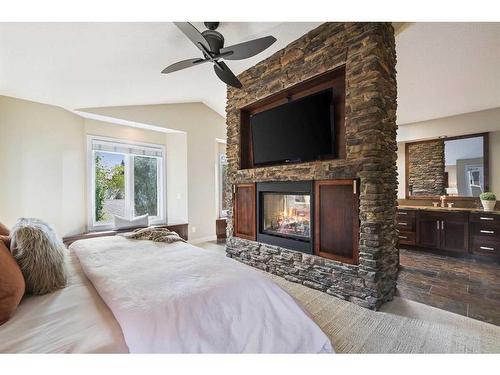 2239 29 Avenue Sw, Calgary, AB - Indoor Photo Showing Bedroom With Fireplace