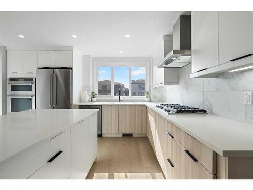 149 Magnolia Terrace Se, Calgary, AB - Indoor Photo Showing Kitchen With Stainless Steel Kitchen With Upgraded Kitchen