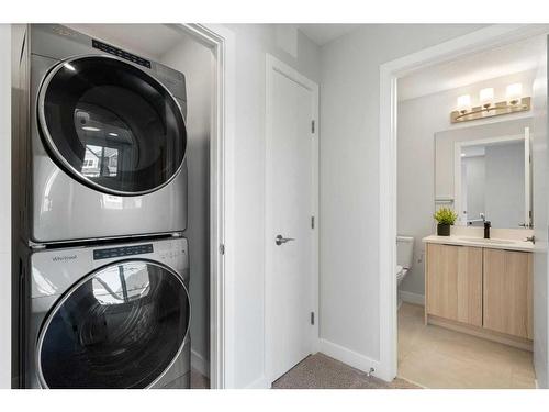 149 Magnolia Terrace Se, Calgary, AB - Indoor Photo Showing Laundry Room