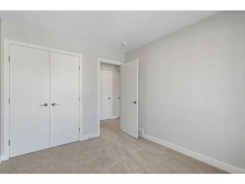 149 Magnolia Terrace Se, Calgary, AB - Indoor Photo Showing Other Room