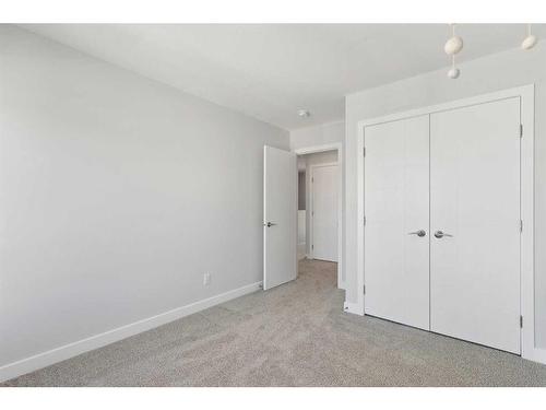 149 Magnolia Terrace Se, Calgary, AB - Indoor Photo Showing Other Room