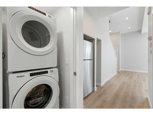 149 Magnolia Terrace Se, Calgary, AB - Indoor Photo Showing Laundry Room