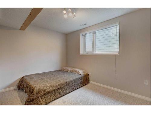 171 Bracewood Way Sw, Calgary, AB - Indoor Photo Showing Bedroom