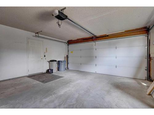 171 Bracewood Way Sw, Calgary, AB - Indoor Photo Showing Garage