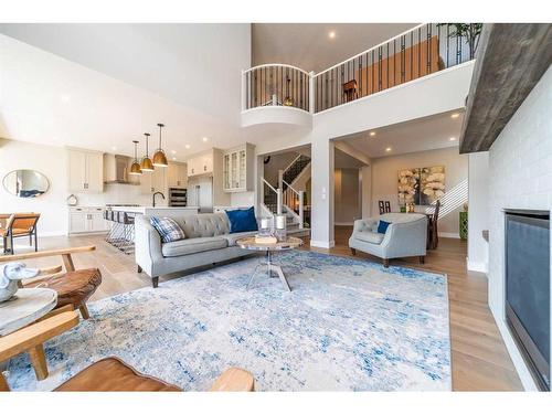 65 Auburn Shores Cape Se, Calgary, AB - Indoor Photo Showing Living Room With Fireplace