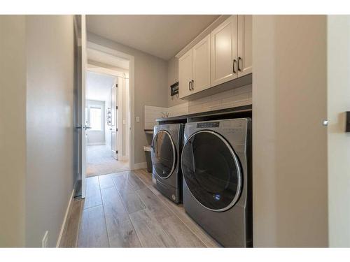 65 Auburn Shores Cape Se, Calgary, AB - Indoor Photo Showing Laundry Room