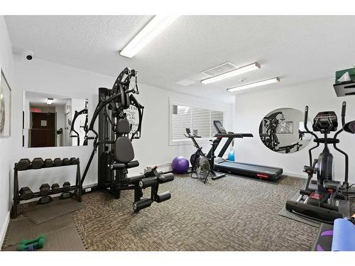 212-550 Westwood Drive Sw, Calgary, AB - Indoor Photo Showing Gym Room