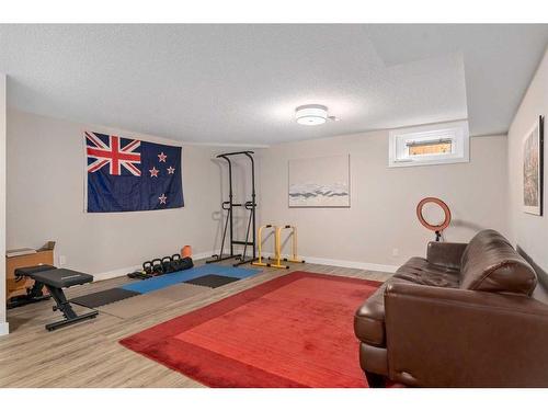 128 Oakridge Place Sw, Calgary, AB - Indoor Photo Showing Gym Room