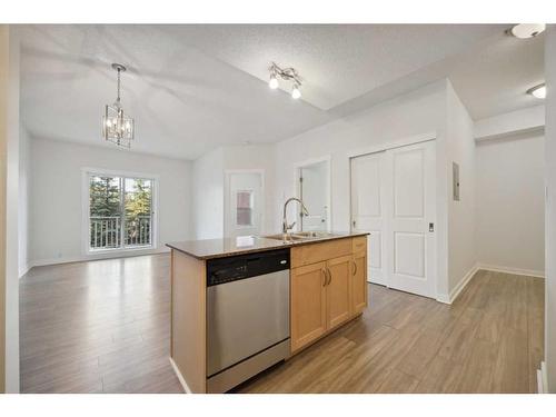 2306-5605 Henwood Street Sw, Calgary, AB - Indoor Photo Showing Kitchen With Double Sink