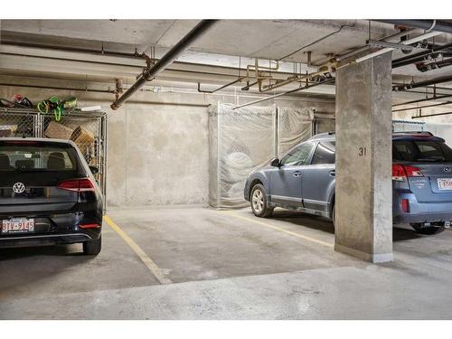 2306-5605 Henwood Street Sw, Calgary, AB - Indoor Photo Showing Garage