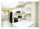 260 Saddlebrook Point Ne, Calgary, AB  - Indoor Photo Showing Kitchen With Double Sink 