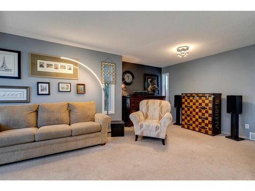 179 Mountain Park Drive Se, Calgary, AB - Indoor Photo Showing Living Room