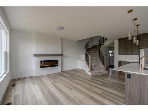 1198 Chinook Winds Circle Sw, Airdrie, AB - Indoor With Fireplace