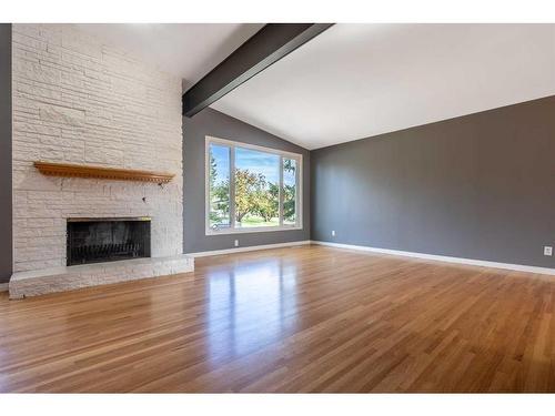 68 Southampton Drive Sw, Calgary, AB - Indoor Photo Showing Living Room With Fireplace