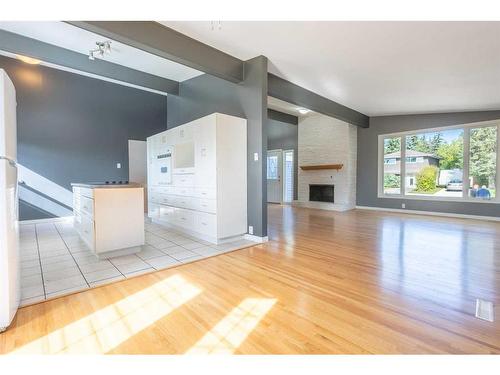 68 Southampton Drive Sw, Calgary, AB - Indoor Photo Showing Other Room With Fireplace