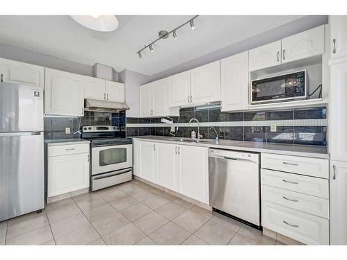 135 Prominence Heights Sw, Calgary, AB - Indoor Photo Showing Kitchen