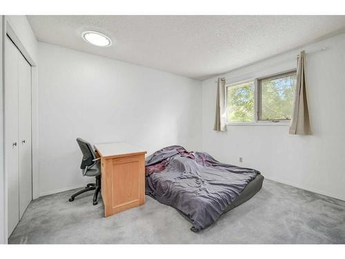 135 Prominence Heights Sw, Calgary, AB - Indoor Photo Showing Bedroom