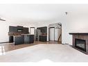 420 Eversyde Way Sw, Calgary, AB  - Indoor With Fireplace 