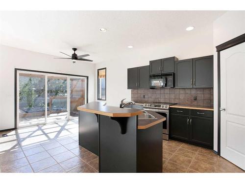 420 Eversyde Way Sw, Calgary, AB - Indoor Photo Showing Kitchen