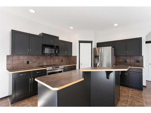 420 Eversyde Way Sw, Calgary, AB - Indoor Photo Showing Kitchen With Stainless Steel Kitchen With Upgraded Kitchen