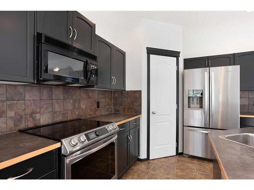 420 Eversyde Way Sw, Calgary, AB - Indoor Photo Showing Kitchen With Stainless Steel Kitchen