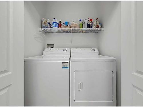 356 Sunrise Terrace Ne, High River, AB - Indoor Photo Showing Laundry Room