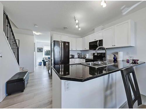 356 Sunrise Terrace Ne, High River, AB - Indoor Photo Showing Kitchen With Stainless Steel Kitchen With Double Sink