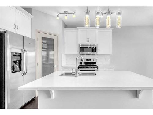 1186 Evanston Drive Nw, Calgary, AB - Indoor Photo Showing Kitchen With Stainless Steel Kitchen With Double Sink With Upgraded Kitchen