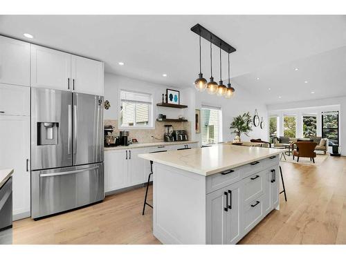 52 Woodstock Way Sw, Calgary, AB - Indoor Photo Showing Kitchen With Upgraded Kitchen