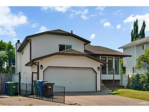 52 Woodstock Way Sw, Calgary, AB - Outdoor