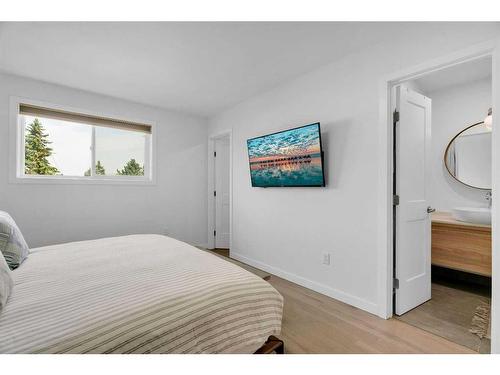 52 Woodstock Way Sw, Calgary, AB - Indoor Photo Showing Bedroom