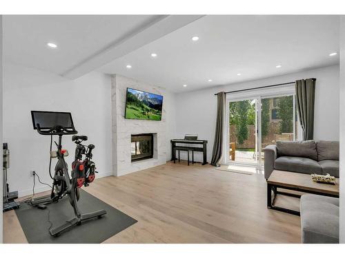 52 Woodstock Way Sw, Calgary, AB - Indoor Photo Showing Gym Room