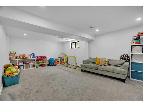 52 Woodstock Way Sw, Calgary, AB - Indoor Photo Showing Basement