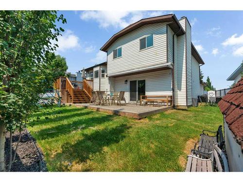 52 Woodstock Way Sw, Calgary, AB - Outdoor With Deck Patio Veranda