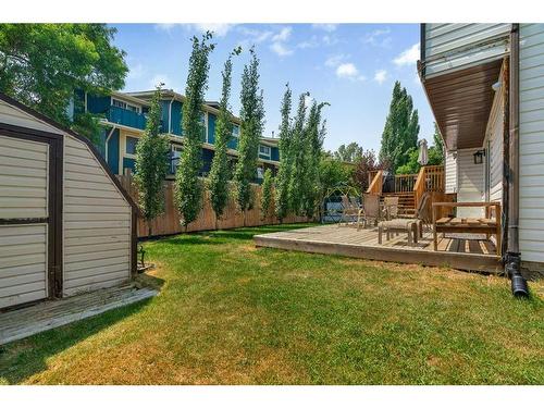 52 Woodstock Way Sw, Calgary, AB - Outdoor