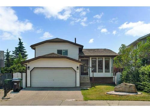 52 Woodstock Way Sw, Calgary, AB - Outdoor