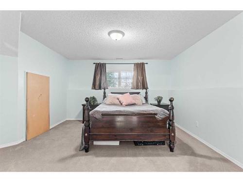 317 Carriage Lane Drive, Carstairs, AB - Indoor Photo Showing Bedroom